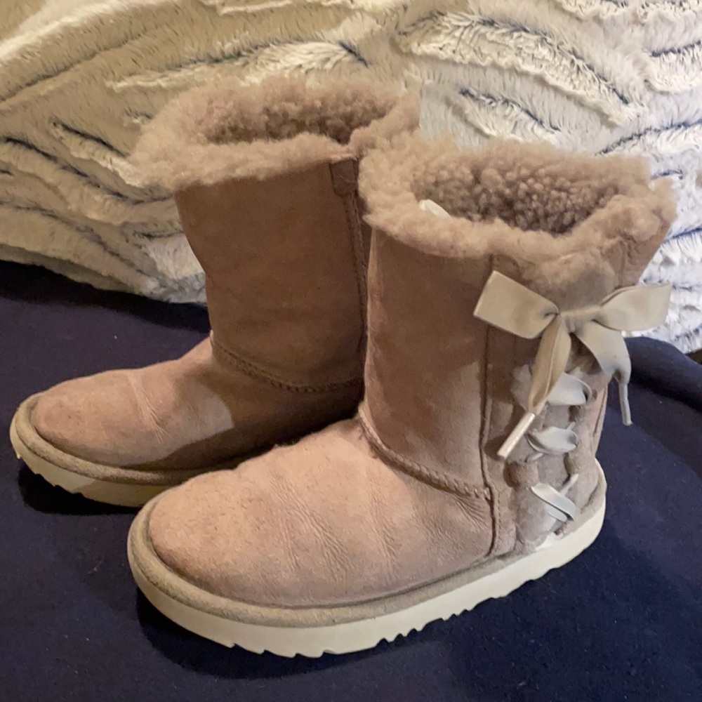 Gray Ugg Boots with bows and ribbon